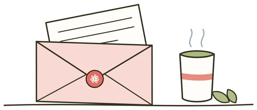 Une lettre ouverte et une tasse de thé vert